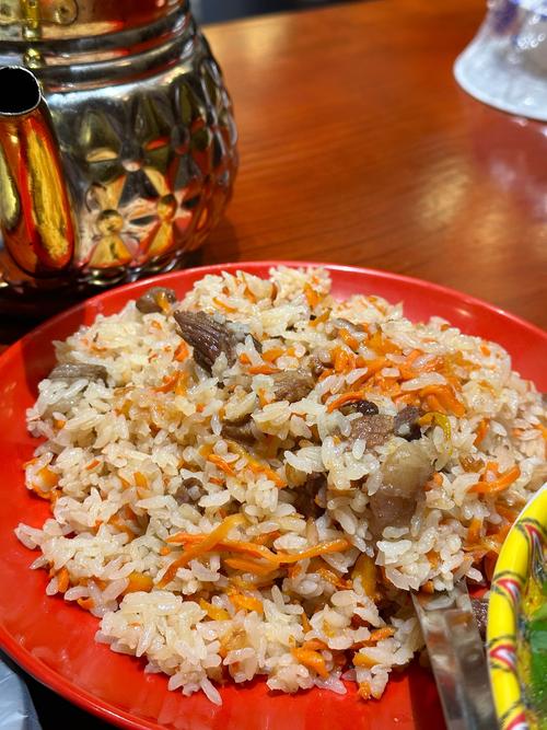 惊爆！手抓饭：烫嘴也停不下来的美食 狂潮”